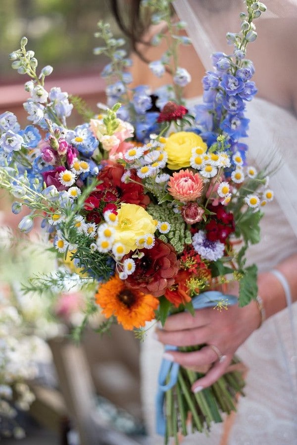Colorful spring wildflower boho bridal bouquet at the Spirit of the Suwannee Music Park