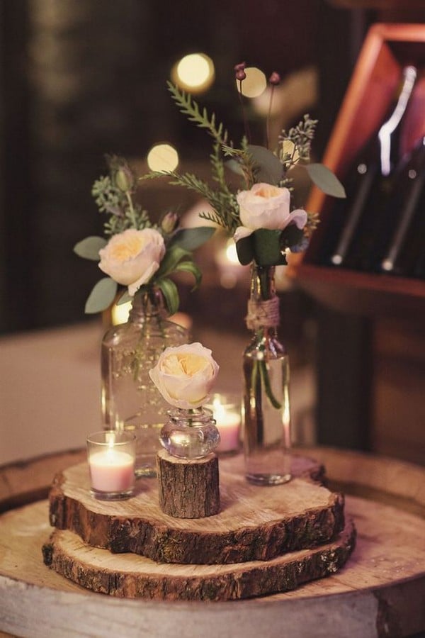 DIY wedding centerpiece with tree stumps