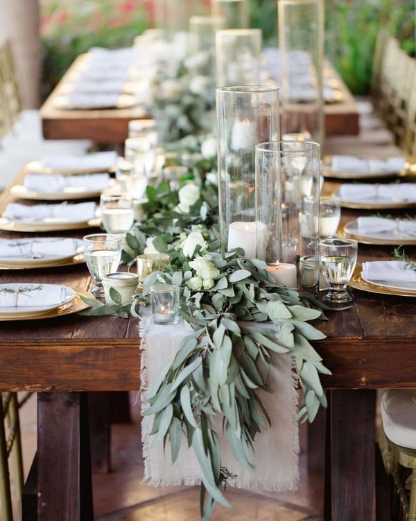 Eucalyptus and candles wedding centerpiece decor