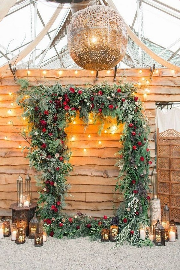 Lush Green and Red Floral Wedding Arches - winter, winter wedding, winter wedding ideas,winter ceremony decoration
