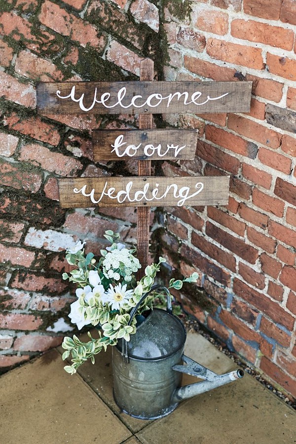 Rustic Wooden Sign Post Welcome Watering Can Flowers