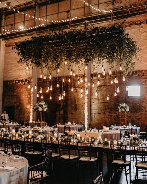 Rustic country barn wedding reception greenery decor