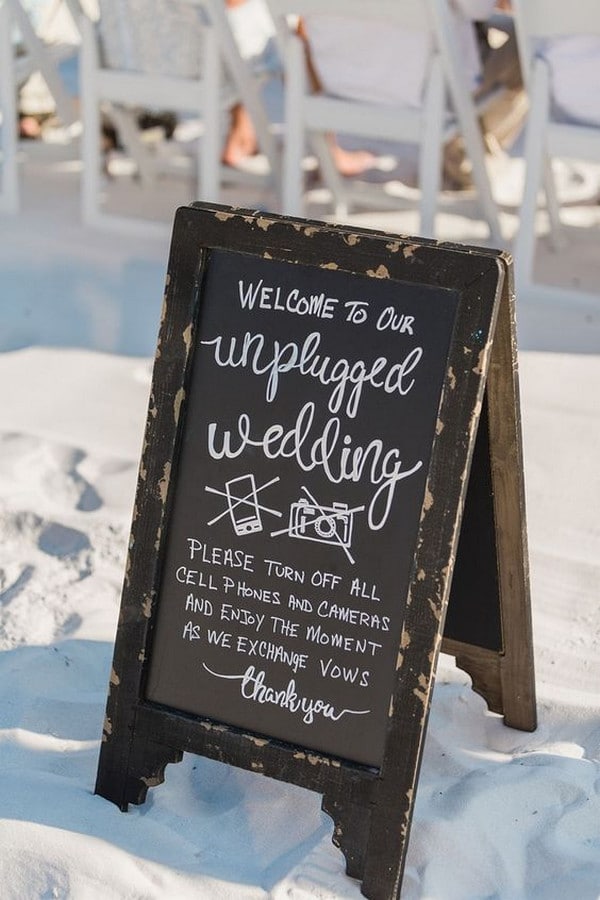 Unplugged wedding sign at a beach wedding