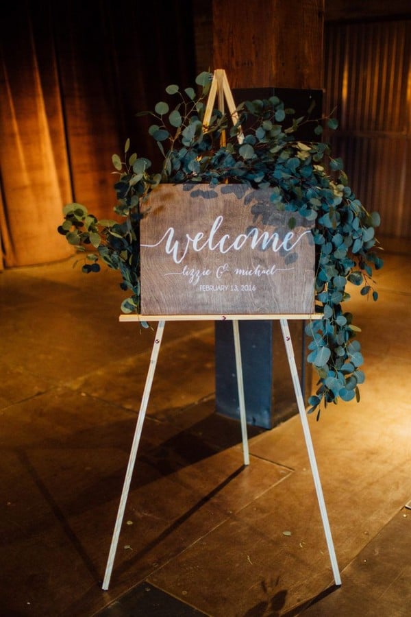 Wedding welcome sign with silver dollar eucalyptus garland