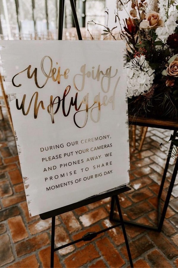 acrylic unplugged ceremony sign with gold foiled hand lettering