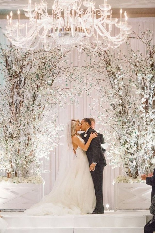 all white indoor winter wedding backdrop