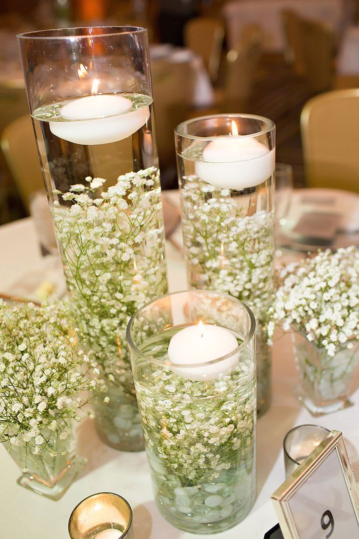 baby breath and floating candle wedding centerpiece