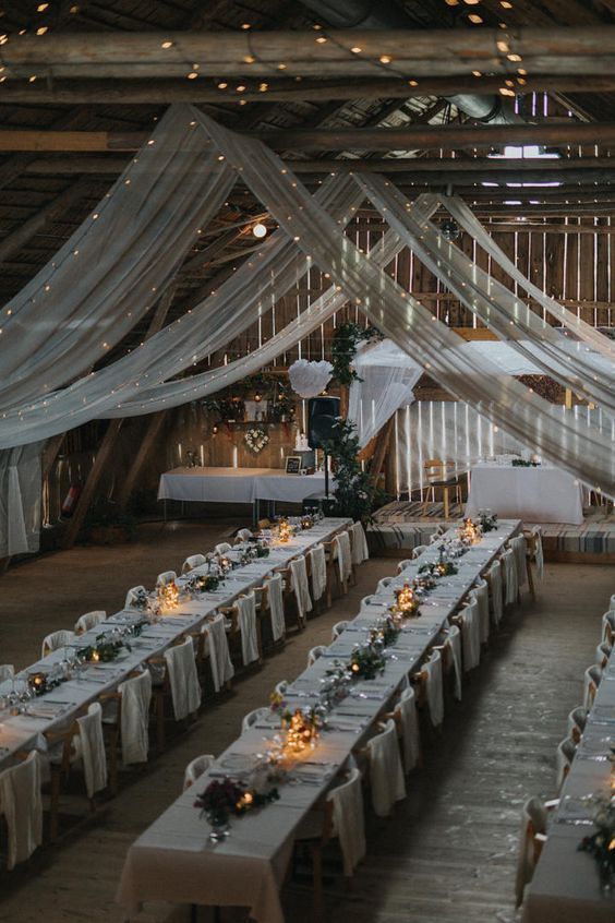 barn wedding table reception ideas with ivory draping