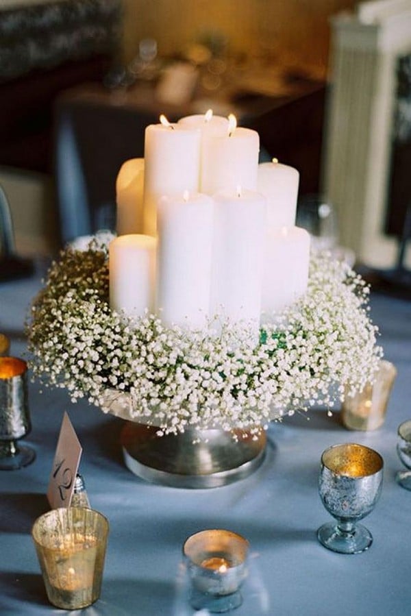 budget friendly wedding centerpiece with babys breath and candles