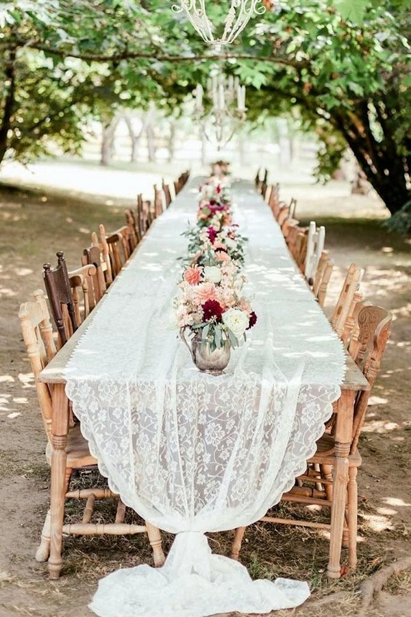 cheap boho decor bohemian long table with vintage chairs and lace tablecloth oly photography