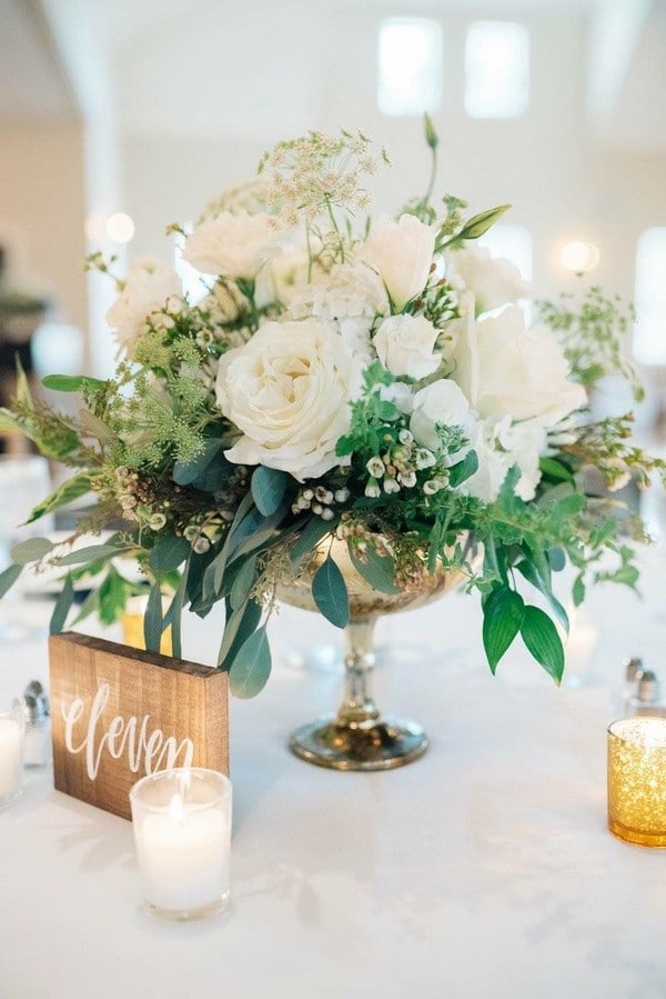 classic white and greenery wedding centerpiece