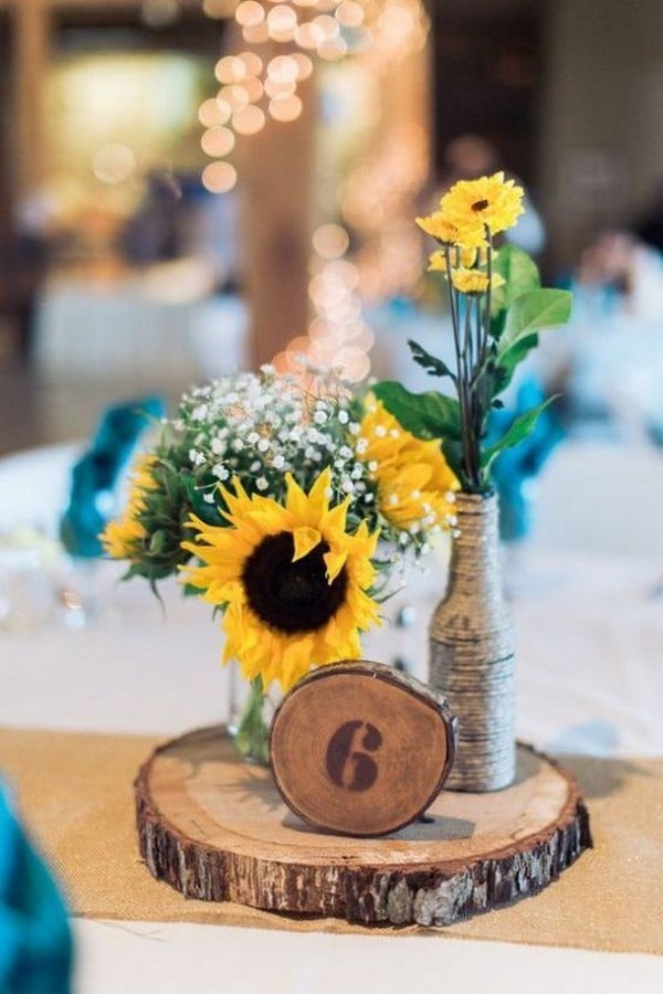 country rustic wedding centerpiece with sunflower and babys breath