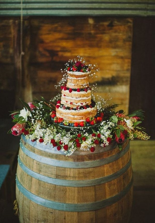 country wedding cake ideas with wine barrel stand