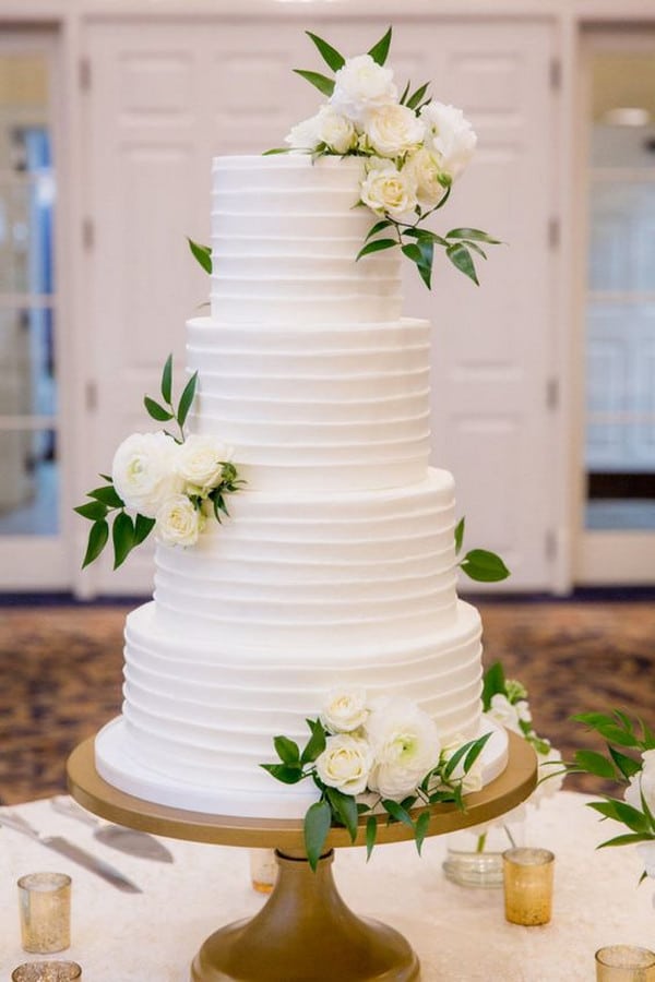 elegant white and green wedding cake
