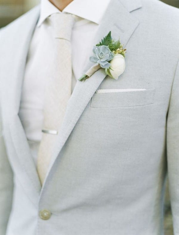 grey groom wedding suit with succulent