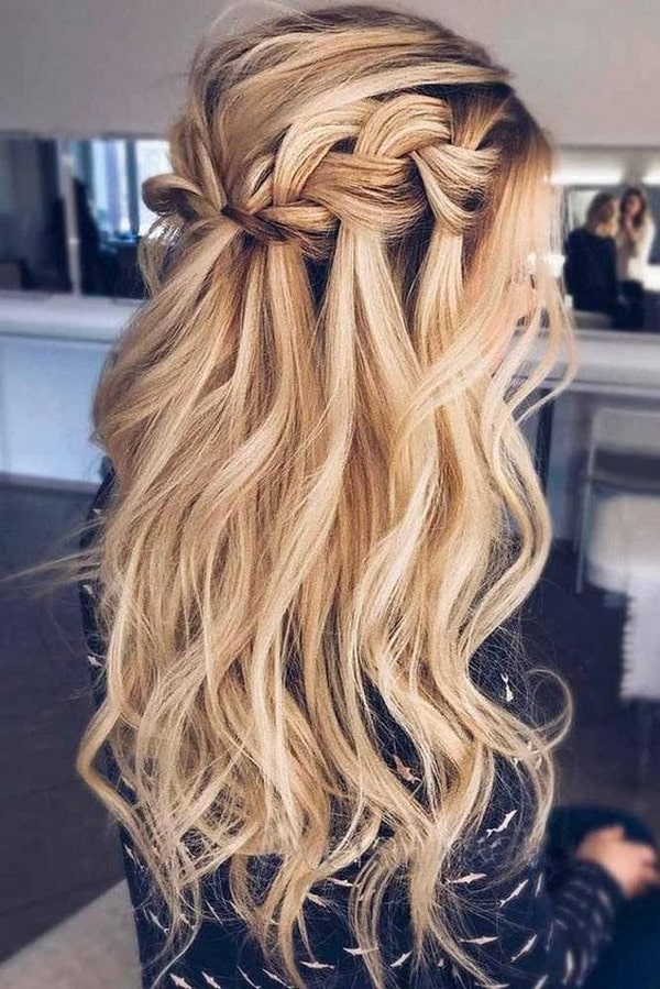 half up half down wedding hairstyle with curls and braid