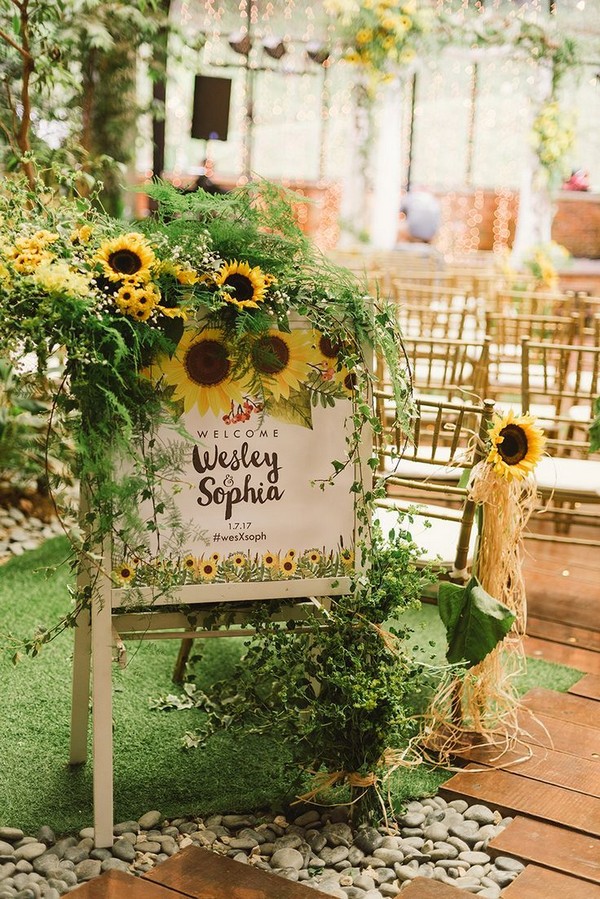 indoor garden wedding sign with sunflowers