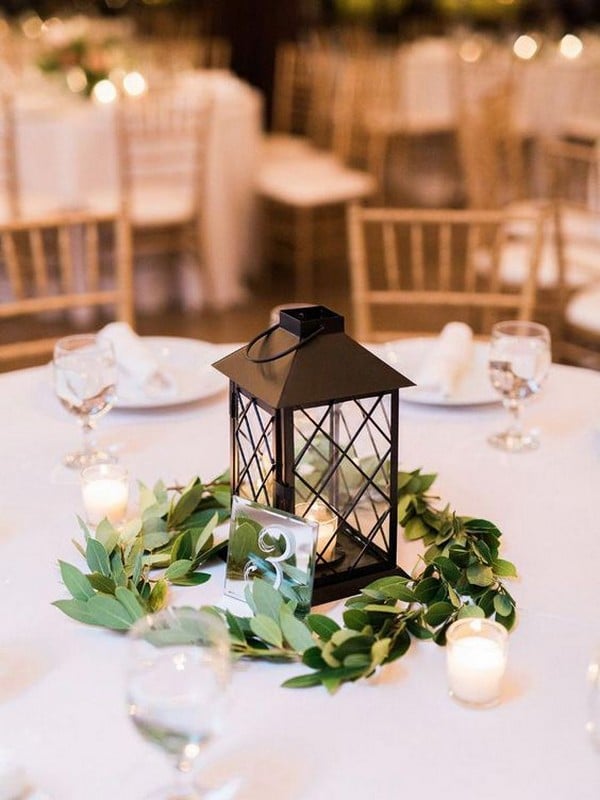 lattice lantern wedding centerpiece with greenery