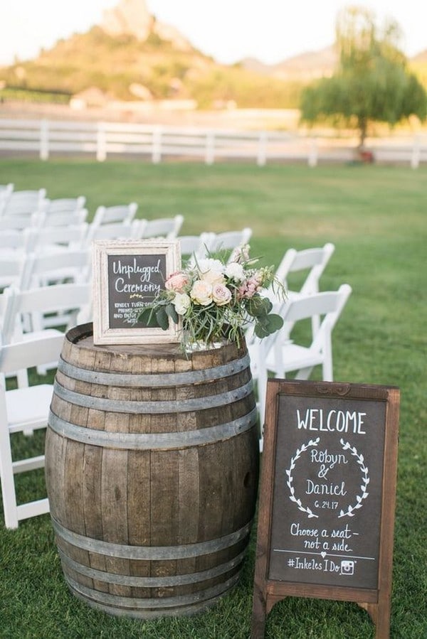 outdoor country wedding ceremony ideas with wine barrles