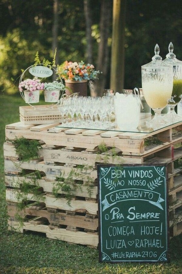 outdoor wedding drink station with wooden pallets