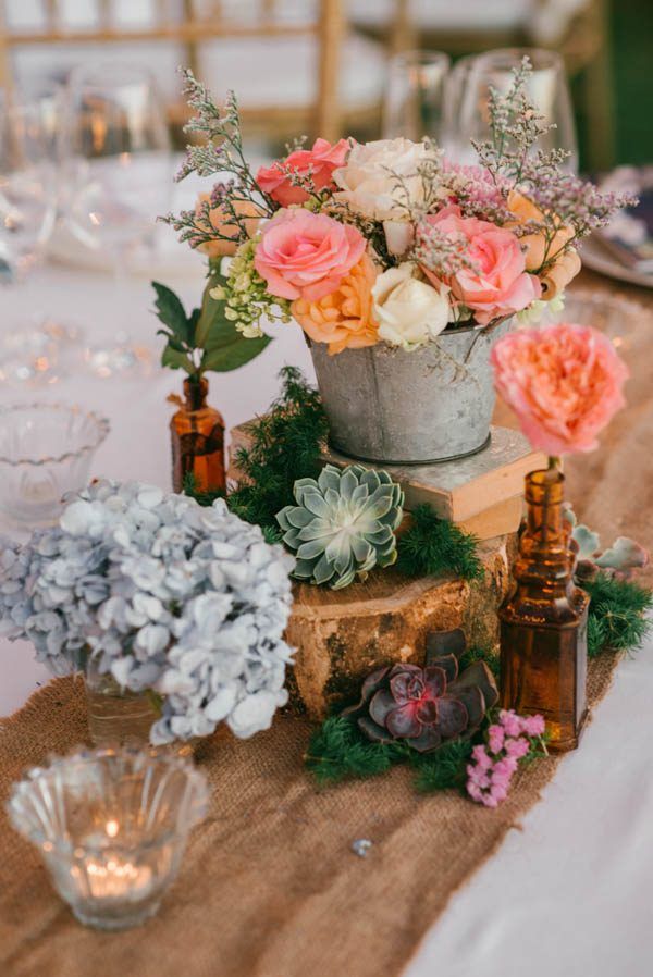 peach and light blue flowers watering can wedding decor