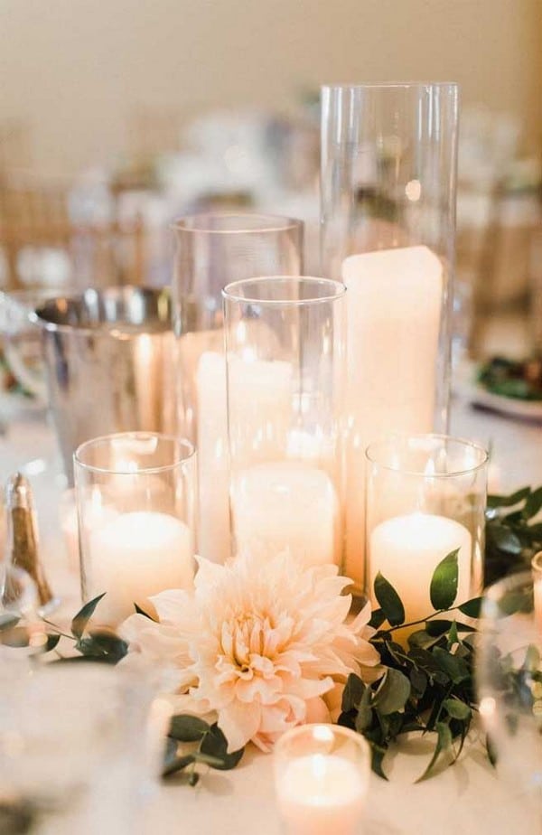 pink flowers and candles wedding centerpiece
