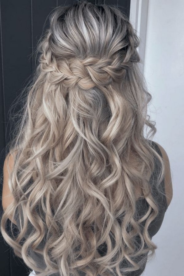 romantic braided half up half down wedding hairstyle