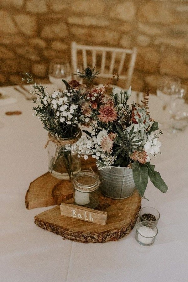 rustic tree stump wedding centerpieces