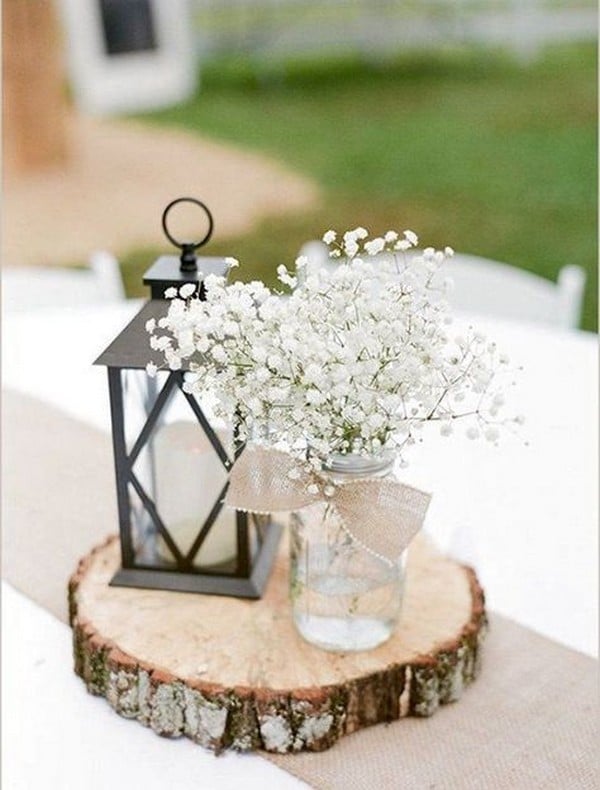 rustic wedding centerpiece with lantern and babys breath