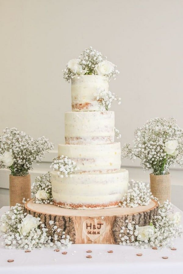 semi naked rustic wedding cake with babys breath