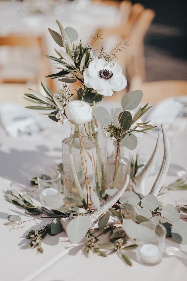simple anemones and eucalyptus wedding centerpiece