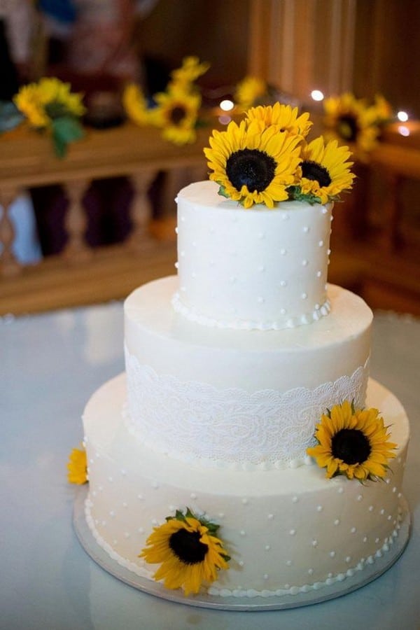 simple wedding cake with sunflowers