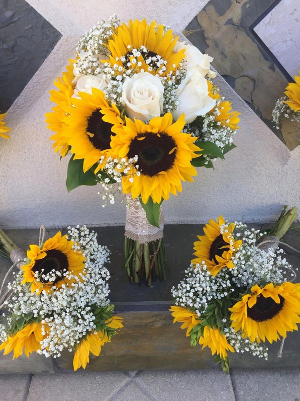 sunflowers babys breath and white roses wedding bouquets