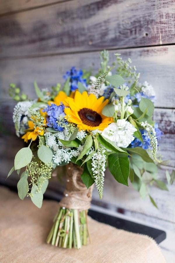 sunflowers blue hydrangea and eucalyptus wedding bouquet