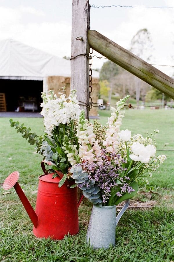 sweet country watering can country wedding decor ideas