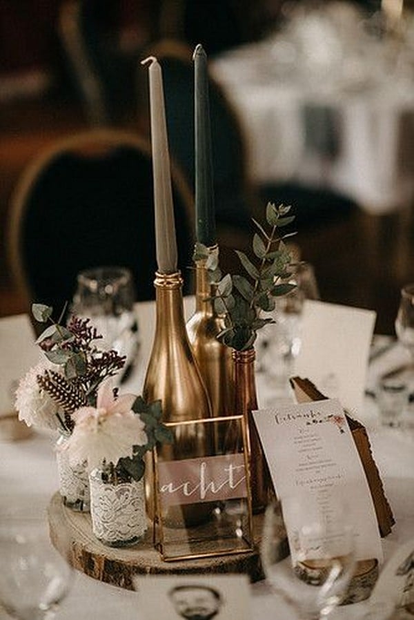 vintage lace and gold bottles wedding centerpiece