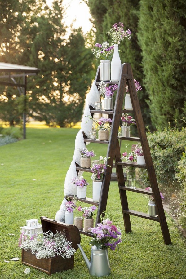 watering can and ladder wedding decoration