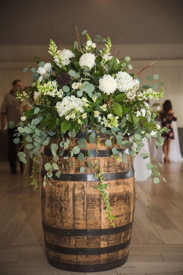 wine barrel and eucalyptus rustic wedding decor