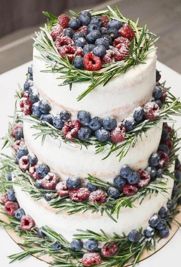 winter wedding cakes with pine cones, holly & berries under the snow and of course snowflakes and icicles