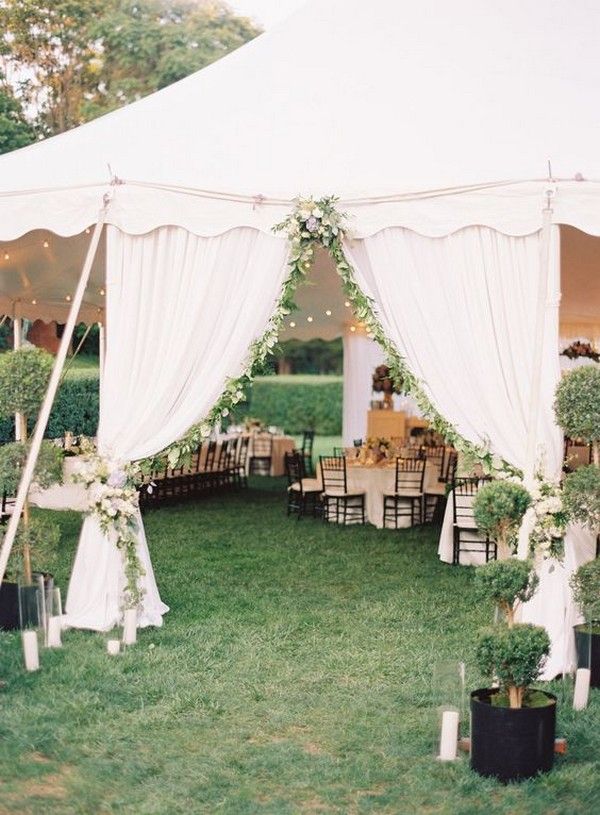 elegant simple green and white tent wedding entrance decorations