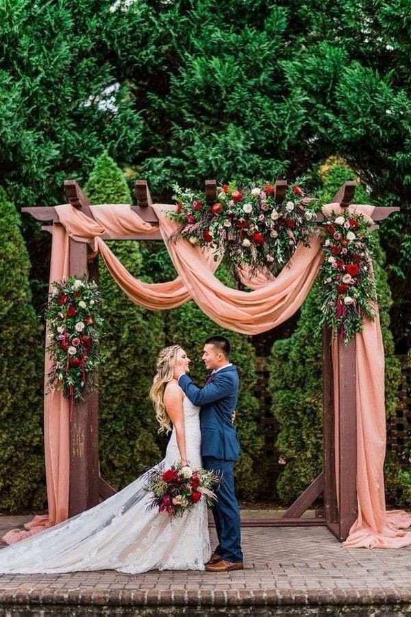 rustic outdoor fall wedding arches and backdrop #wedding #weddingideas #fallwedding #weddingarches