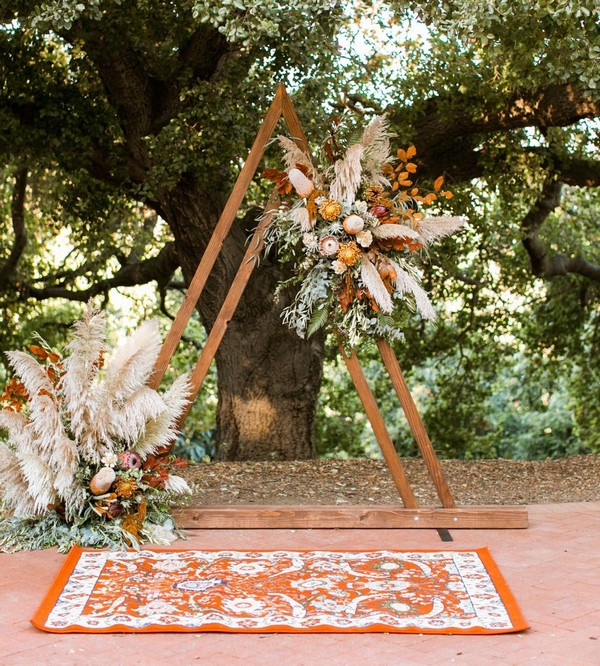 rustic outdoor fall wedding arches and backdrop #wedding #weddingideas #fallwedding #weddingarches