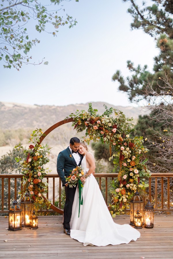 rustic outdoor fall wedding arches and backdrop #wedding #weddingideas #fallwedding #weddingarches