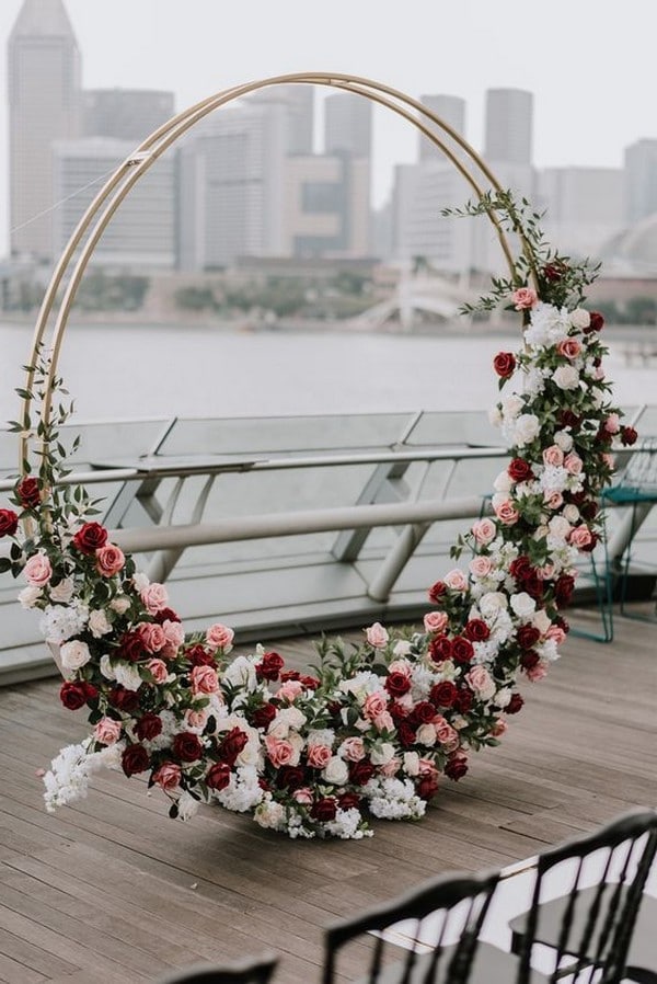 chic modern floral circular wedding arch ideas