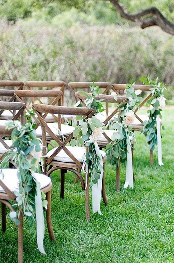 chic outdoor wedding aisle ideas with greenery and ribbons