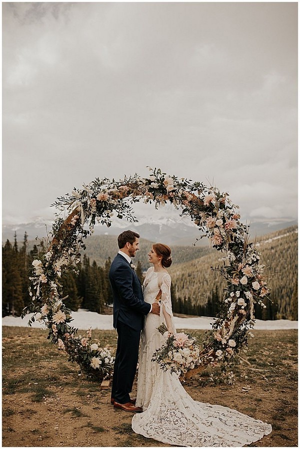 circular blush pink and greenery wedding arches