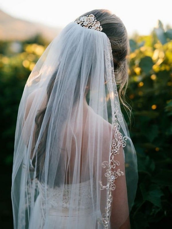 long wedding hairstyle with beaded veil