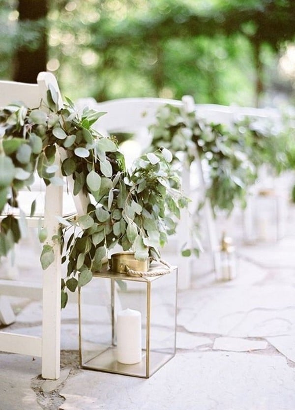 outdoor wedding aisle ideas with lanterns and garland