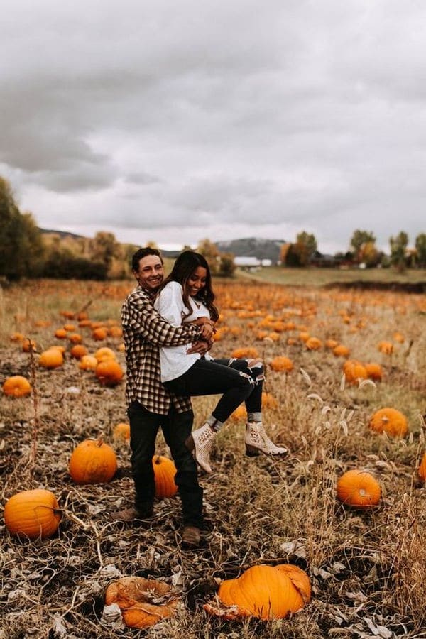 pumpkin patch fall wedding engagement photo