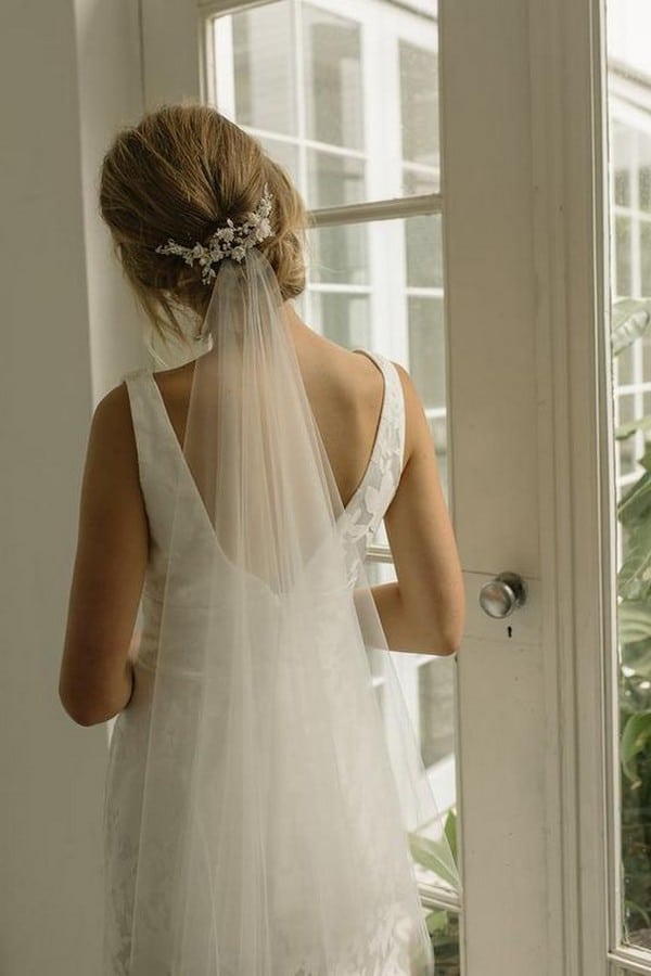 updo wedding hairstyle with veils and accessories